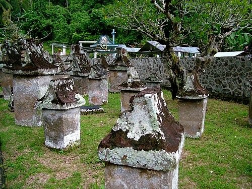 Waruga houses on stone pedestals in a Minahasa traditional village